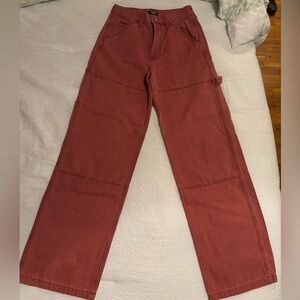 Washed red cargo jeans